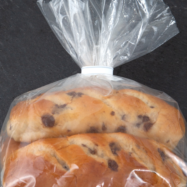 White clip closure on brioche rolls.