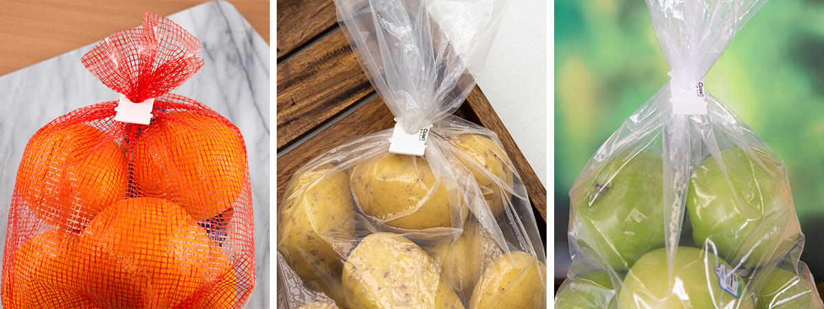 Left: A bag of oranges closed with a white plastic clip. Middle: A bag of potatoes closed by a white CloseIt Clip. Right: A bag of green apples closed by a white bag closure.
