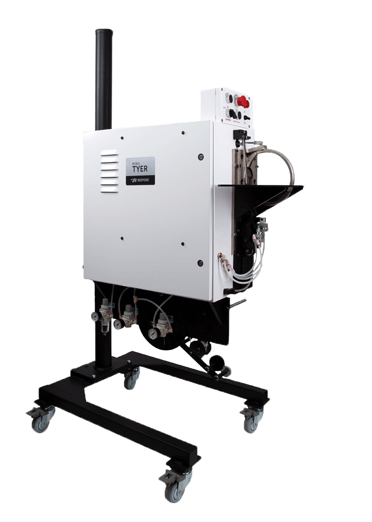 white machine that applies twist ties to secure hoses and cords.