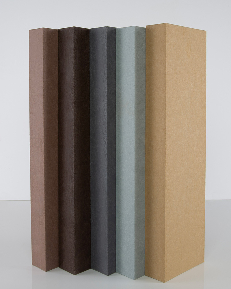 5 recycled plastic lumber boards lined up vertically in various colors.