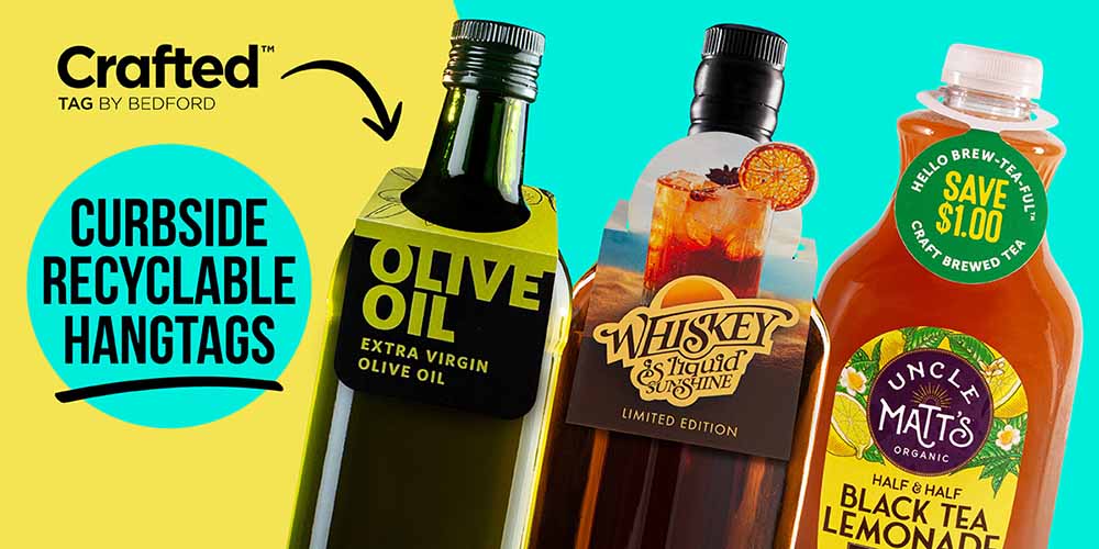 Olive oil, whiskey, and tea bottles with hangtags. "Crafted" logo, "Curbside Recyclable Hangtags" text on a yellow background.
