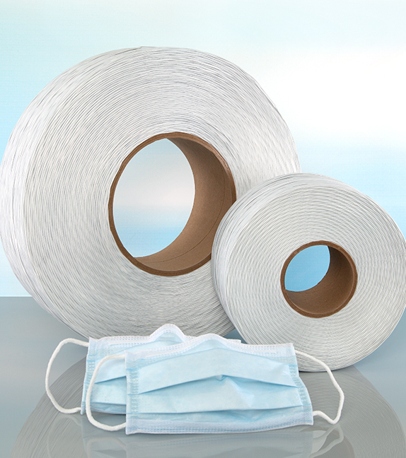 large and small spool of plastic nose tie and two blue disposable face masks with nose bridge strip.