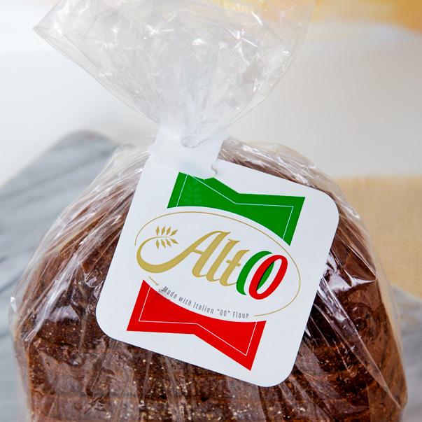 Bread clip with attached flag on Altoo brand bread in green, white, and red.