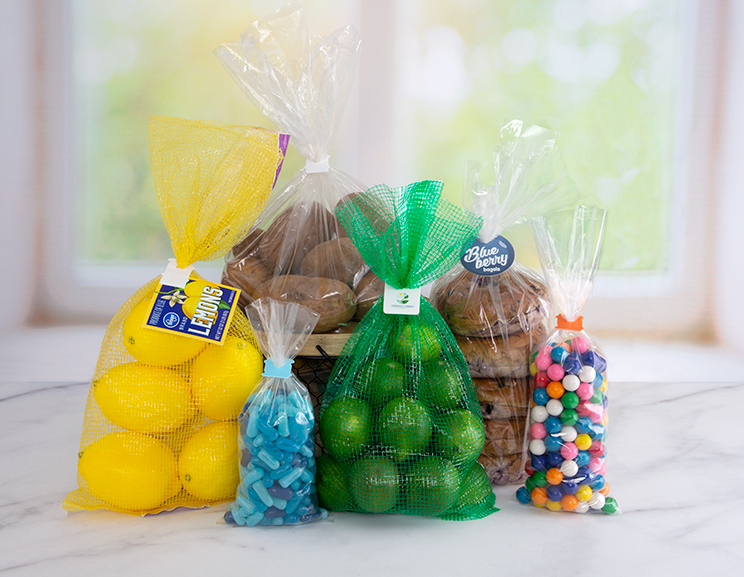 Plastic clip bag closures secure bags of lemons, limes, potatoes, and colorful hard candy.