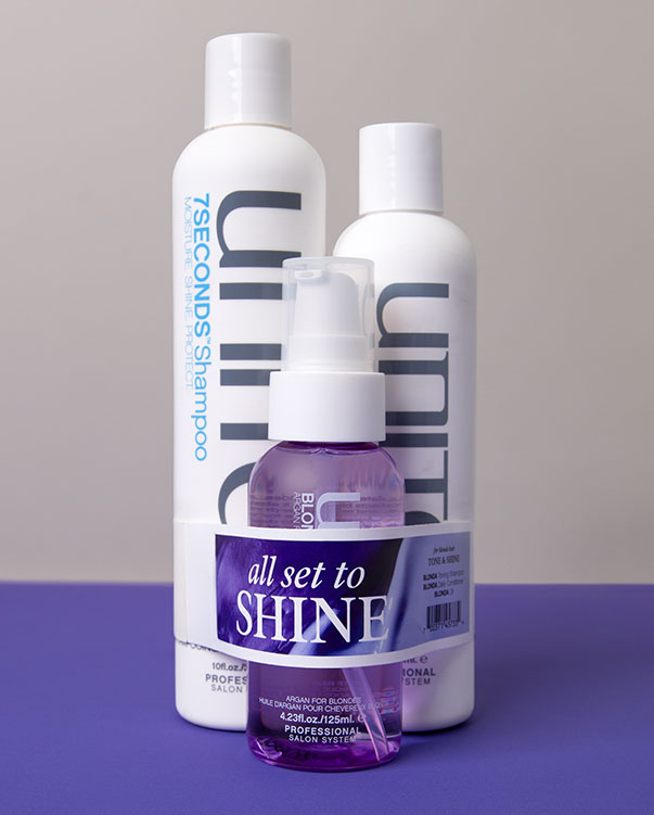 Three Unite hair care products lined combined as a value pack that are banded together with an ElastiTag band.