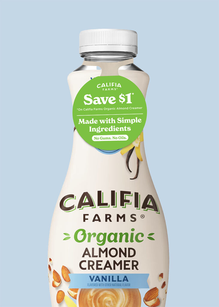 A bottle of Califia Farms Organic Almond Creamer in Vanilla flavor, with a white background. The bottle has a green and white label with the brand name and product details.