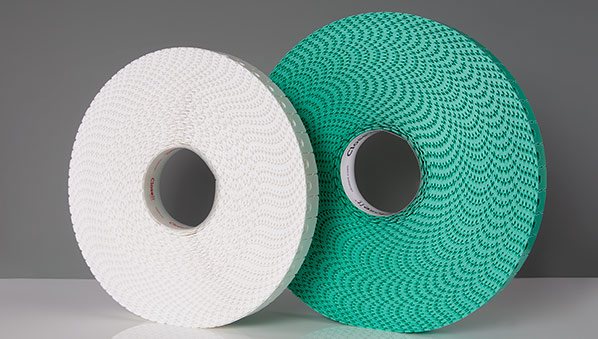 Two rolls of CloseIt bag closure clips, one white and one green.